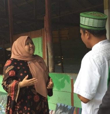 Bupati Muarojambi, Masnah Busro, menghadiri acara Yudisium, Wisuda dan Tahfizul Quran, Khotmul Kutub ke-7. Acara di Pondok Pesantren Riyadhul Amien, Desa Danau Lamo, Kecamatan Maro Sebo, Kabupaten Muarojambi