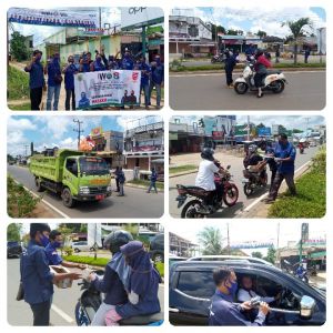 PD IWO Kabupaten Tanjabtim Bagikan Bendera Mini dan Masker di Jalan 