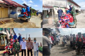 13 Nakes Positif, Tim Gugus Tugas Kecamatan Kuala Jambi Lakukan Penyemprotan Disinfektan Dan Bagi Masker