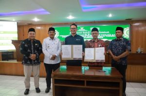 Bupati Tanjabbbar Resmikan QRIS Bersama BAZNAS dan BRI