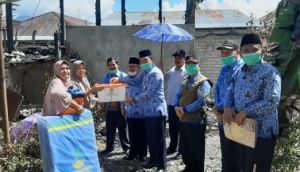 Wabup Kerinci Serahkan Bantuan Korban Kebakaran Kemantan Tinggi   